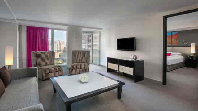 Royalton Park Avenue hotel suite with lounge area for executive business meetings and events.