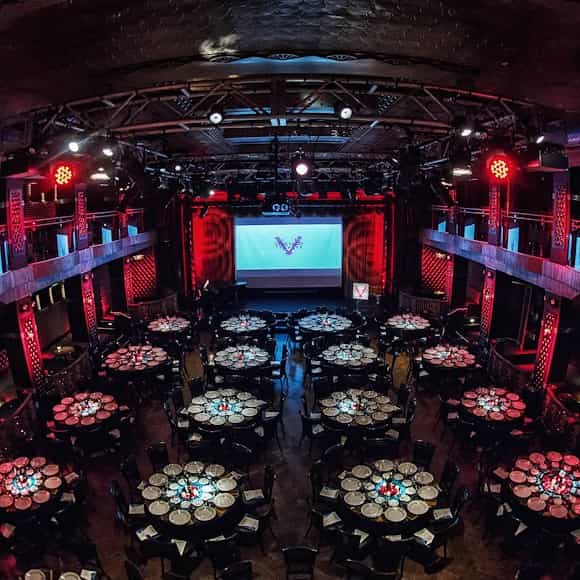 Broadway Meeting Room at Hotel Edison with red lighting for awards galas and corporate events.