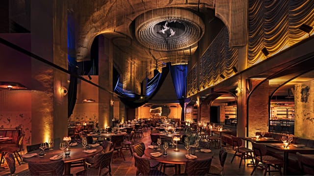 Patio in Cathedrale with dramatic lighting, perfect for upscale gala and immersive dining events.