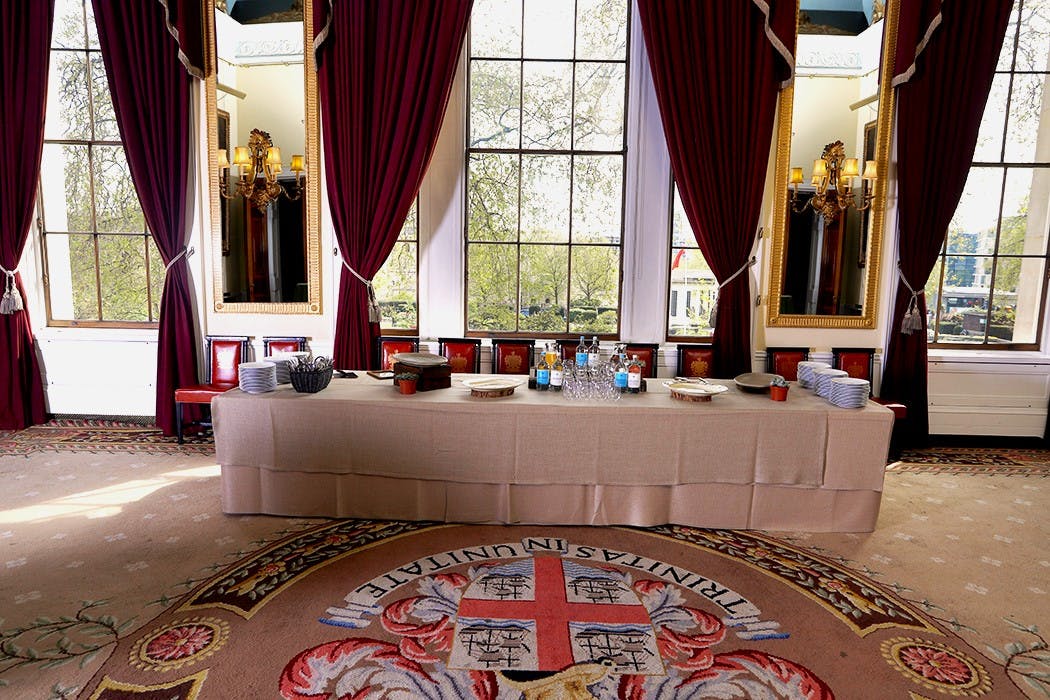 Elegant event space in Trinity House with rich drapery, perfect for high-profile meetings.