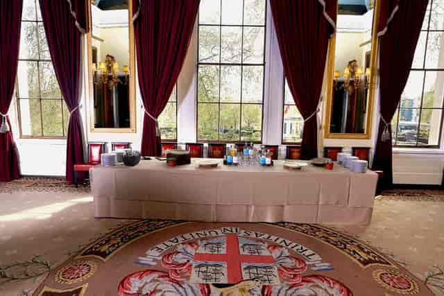 Elegant event space in Trinity House with rich drapery, perfect for high-profile meetings.