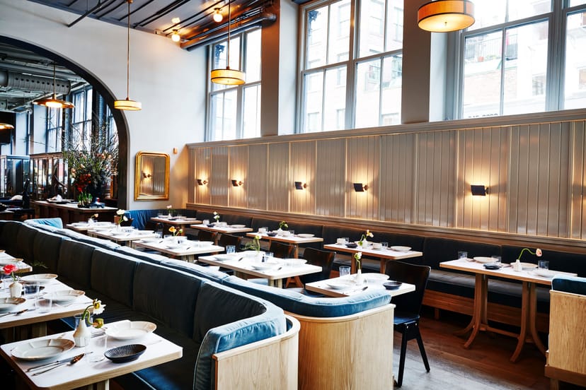 Modern French restaurant, banquette seating, ideal for corporate luncheons and upscale private dinners.