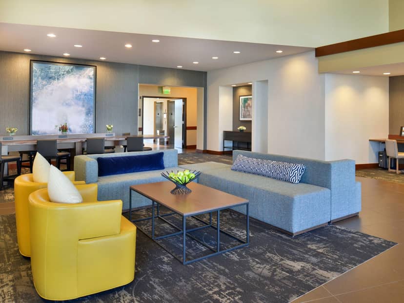 Lobby Lounge breakout area at Garden City Hotel with soft seating for corporate event networking.
