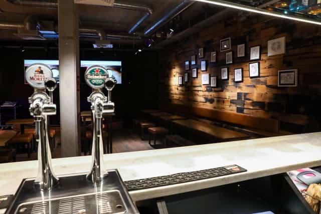 Pilpel's basement bar venue with rustic decor, ideal for evening reception and networking events.