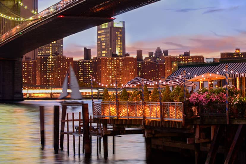 Waterfront restaurant venue with skyline views for exclusive evening reception and corporate events.