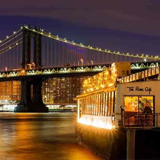 The River Cafe restaurant with Manhattan Bridge view for exclusive corporate event venue.