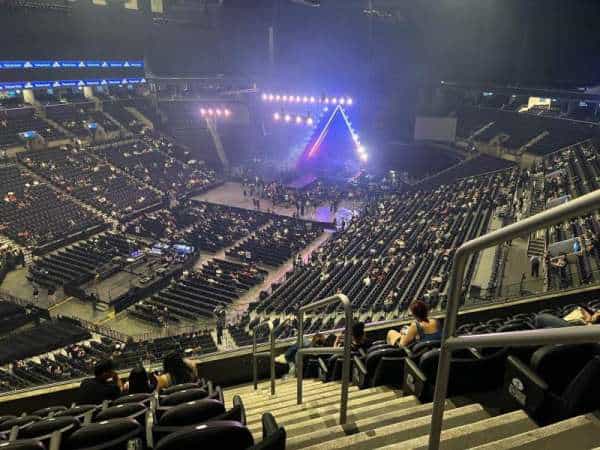 Barclays Center Theater stage setup for events with dramatic lighting and seating arrangements.