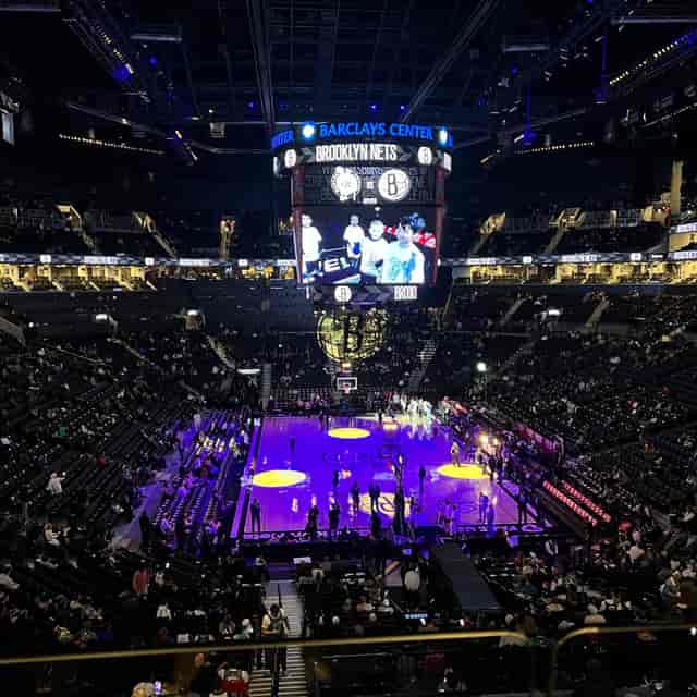 Barclays Center arena set for live basketball event with a vibrant atmosphere.