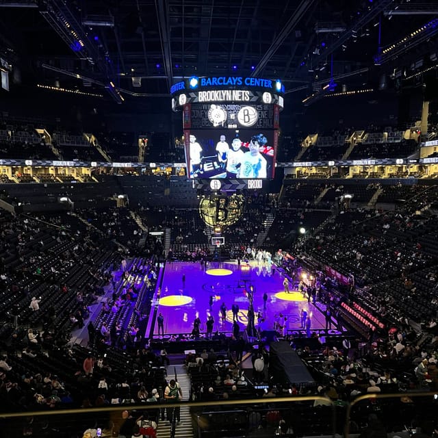 Barclays Center arena set for live basketball event with a vibrant atmosphere.