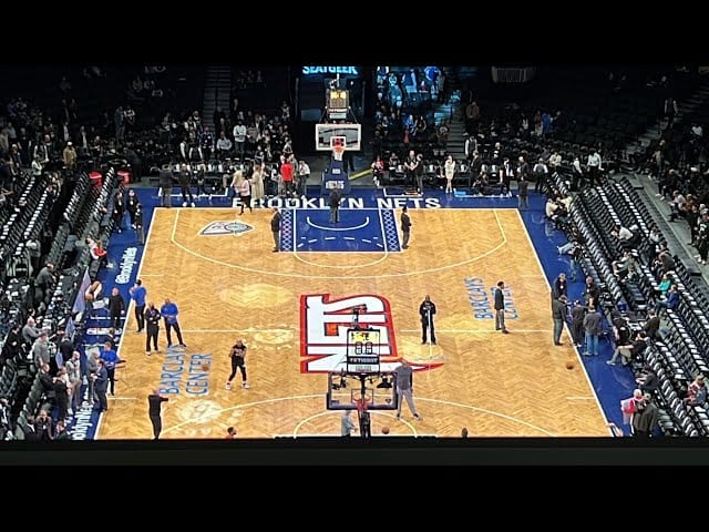 Barclays Center Arena with vibrant court, ready for an exciting basketball game event.