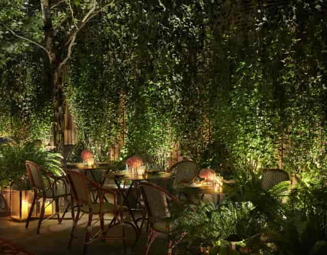 Lush Bowery Garden outdoor dining venue for VIP dinners and romantic events.