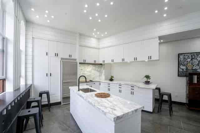 Modern kitchenette at NoHo Triangle Loft for boutique catering and corporate workshops.