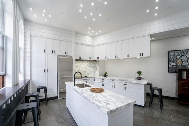 Modern kitchenette at NoHo Triangle Loft for boutique catering and corporate workshops.