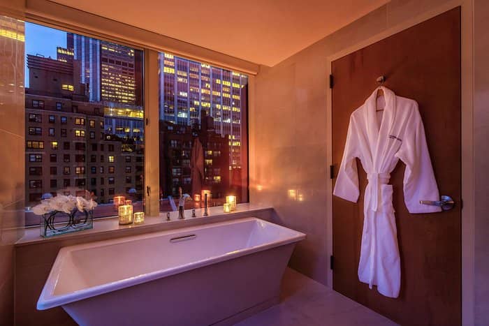 Premium hotel bathroom with soaking tub, perfect for corporate executive retreats and conferences.