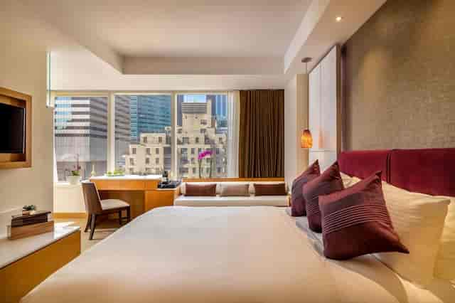 Concorde Hotel New York terrace, premium corporate room with workspace for business travel events.