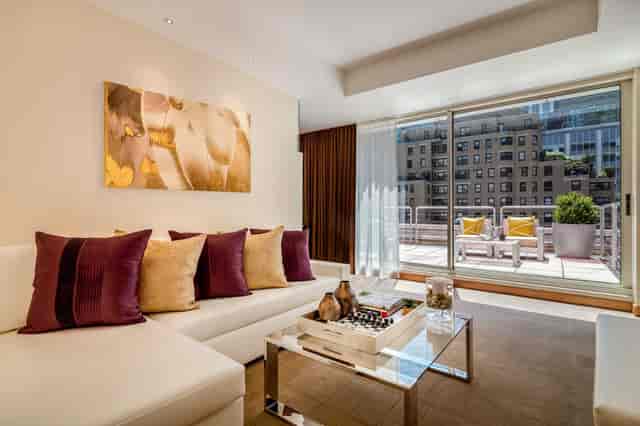 VIP hospitality suite with lounge area for executive meetings and corporate networking.