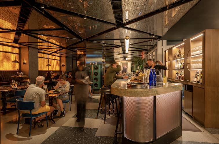 Prime Met Steakhouse rooftop lounge for upscale corporate dinners and networking events.