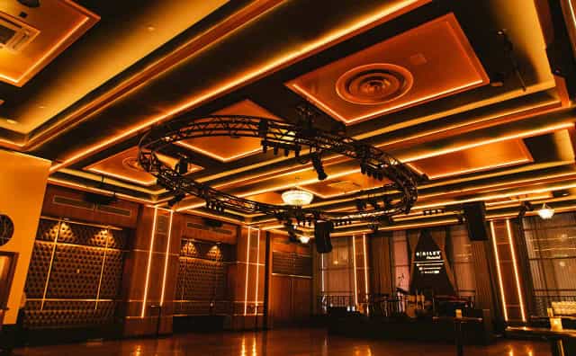 Grand Ballroom with circular truss rig for corporate galas and upscale social events.