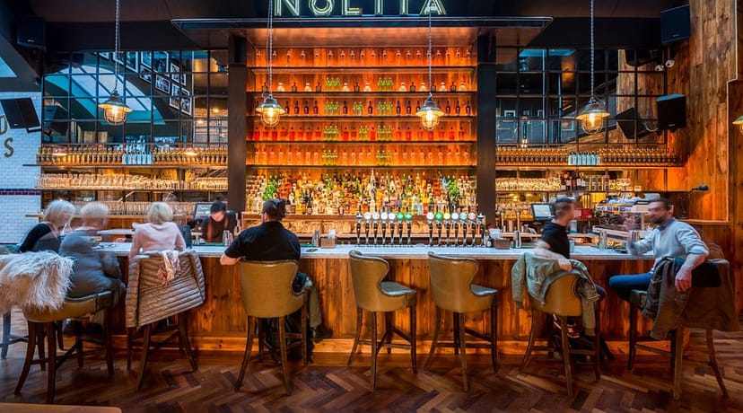 Back-lit bar at upscale NoLita restaurant for corporate reception or private event.