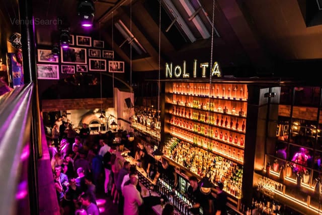 Industrial-chic Whiskey Bar & Balcony for cocktail receptions and corporate mixers in NoLita.