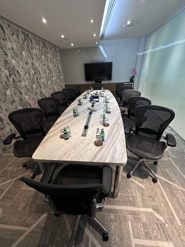 Boardroom at Ocean Financial Centre with stone table for corporate breakout session and meetings.