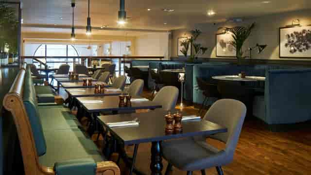 Banquette seating at Bubbles at Browns, ideal for small-group networking and breakout sessions.