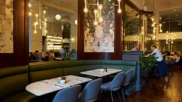 Chic banquet seating at Bubbles at Browns, ideal for executive dining and professional networking.