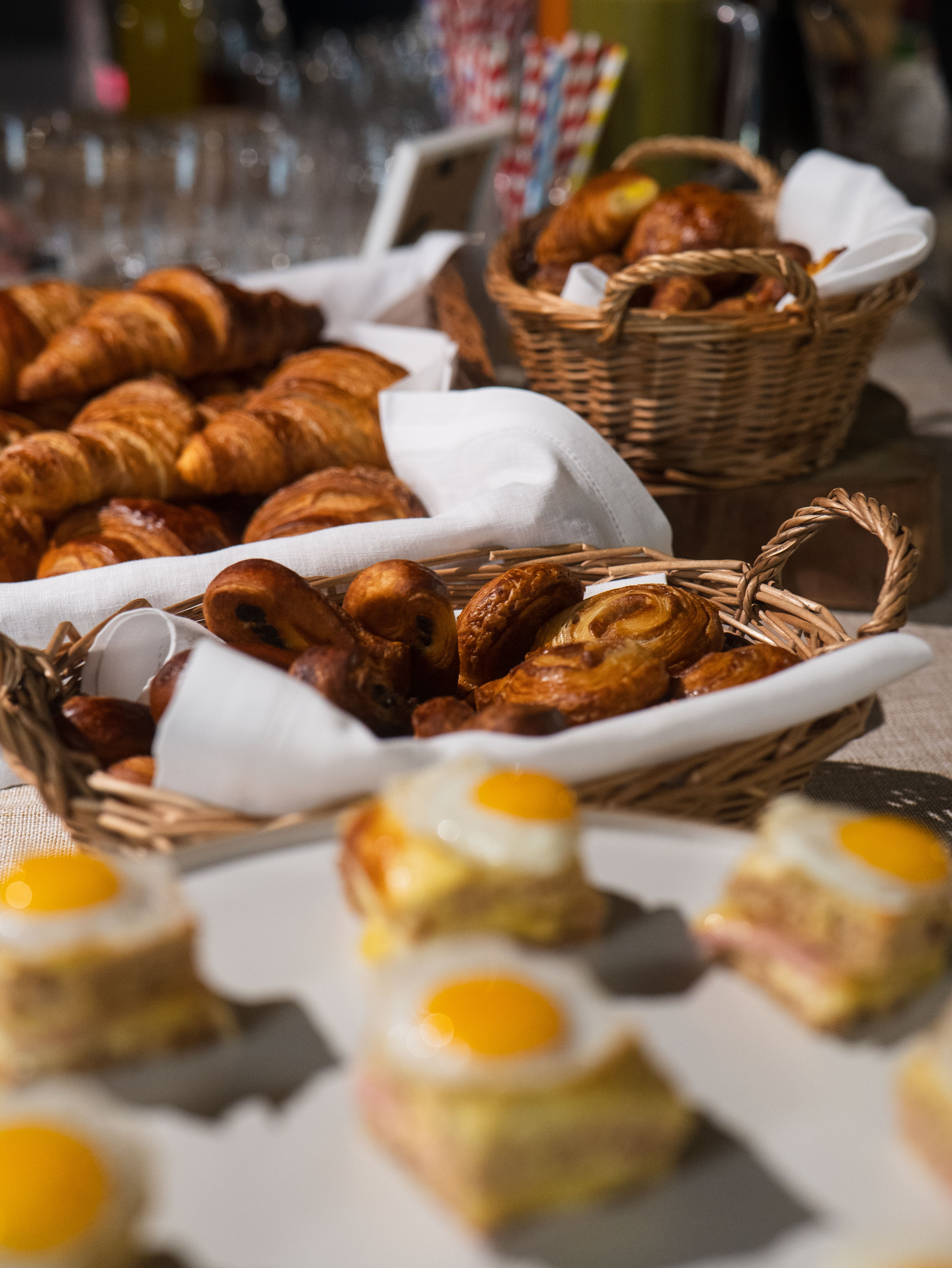 Indoor karting event space with pastries for meetings at K1 Speed Canary Wharf. - Banner