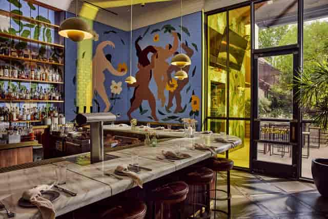 South Congress Hotel Boardroom with mural: ideal for high-end networking and corporate events.