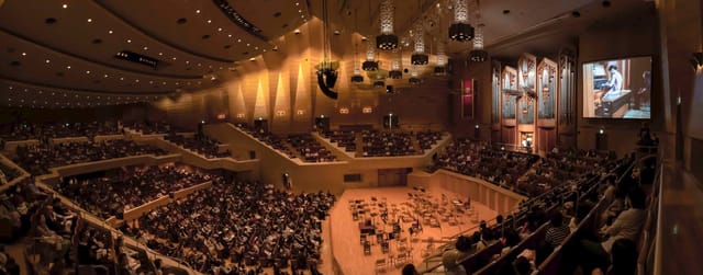Suntory Hall Main Hall: multi-tiered auditorium for orchestral performance and plenary events.