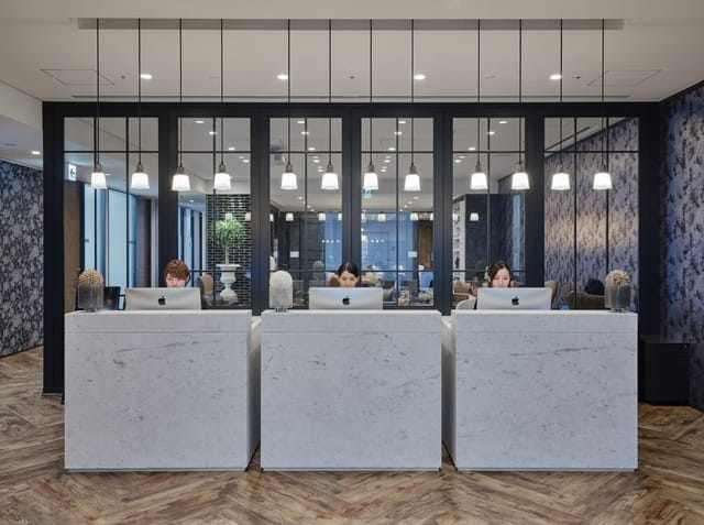 Marble registration desk in Jingumae Tower for corporate events and professional conferences.