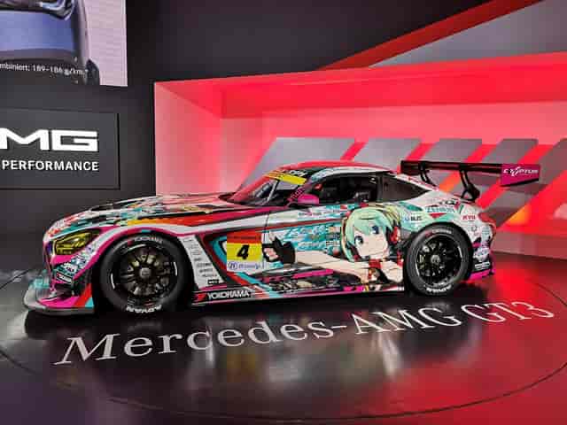 Custom-wrapped vehicle on rotating display at Makuhari Messe experiential marketing event.