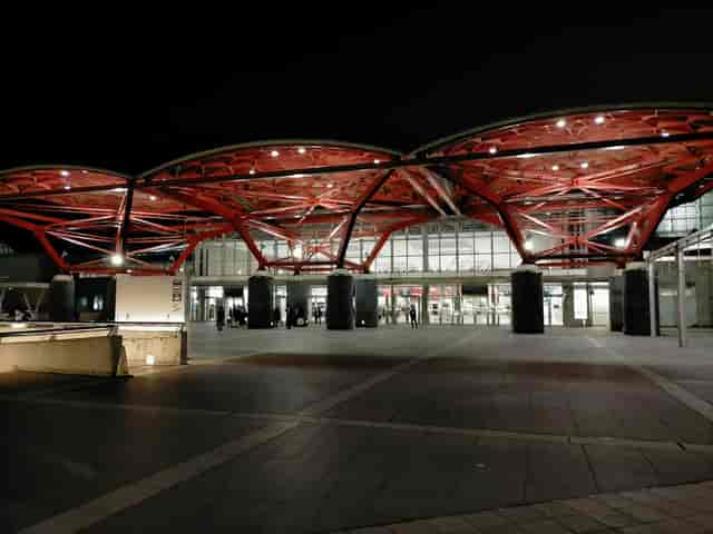 Makuhari Messe Hall 11 entrance with covered forecourt for corporate evening event venue.