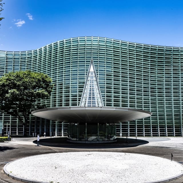 The National Art Center Tokyo entrance: architectural venue for corporate events and product launches.