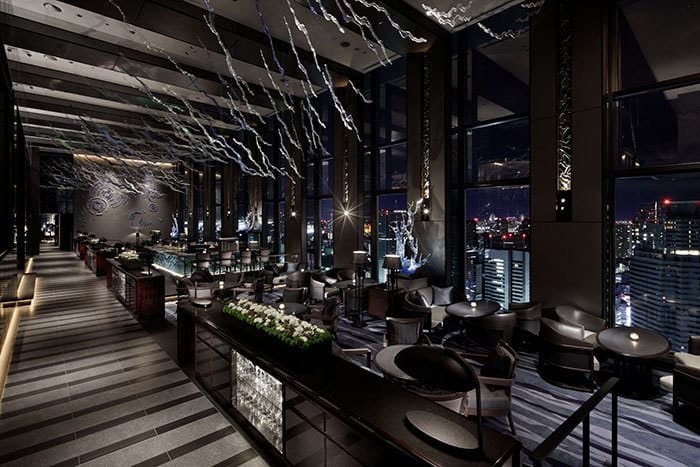 Private dining room with city skyline view for VIP corporate networking and executive receptions.
