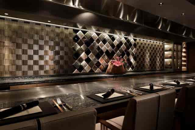 High-end teppanyaki dining space for executive dinners and corporate networking events.