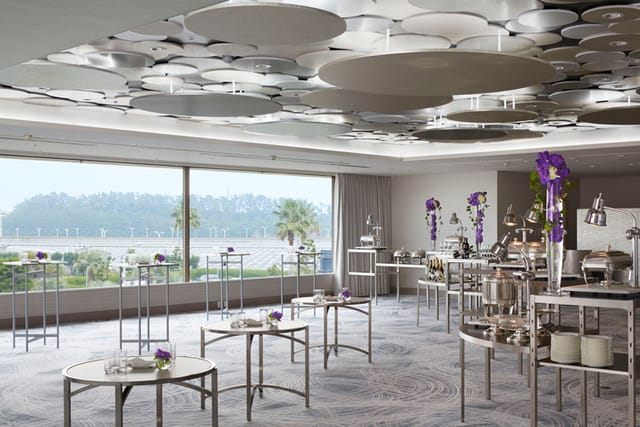 Modern banquet hall at Hilton Tokyo Bay with sculptural ceiling for corporate events and weddings.