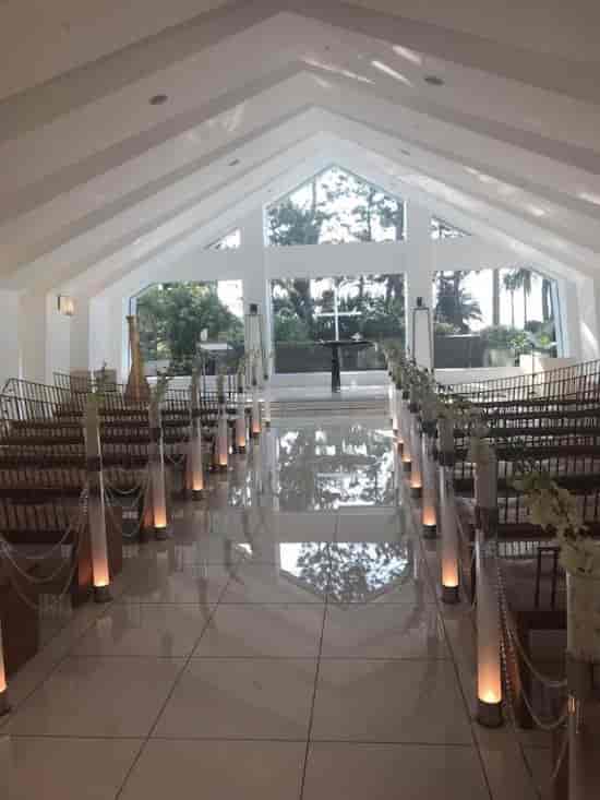 Minimalist Hilton Tokyo Bay wedding chapel with elegant aisle decor for luxury hotel ceremonies.