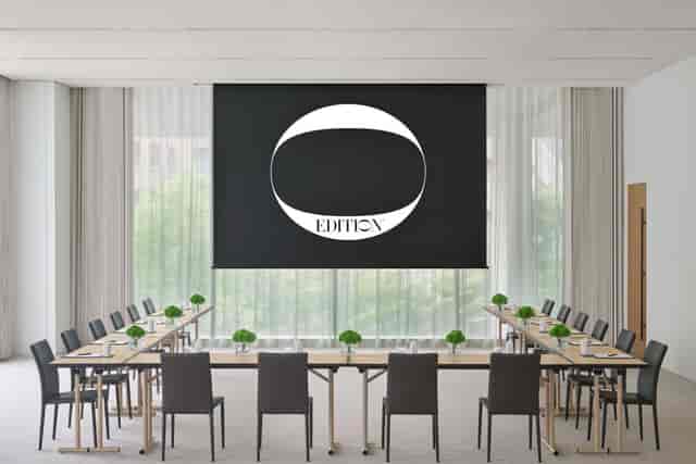Minimalist U-shape boardroom at The Tokyo EDITION for corporate meetings and workshops.