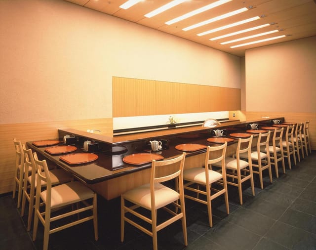 Executive boardroom dinner setup at Hotel Grand Arc Hanzomon for corporate events and networking.