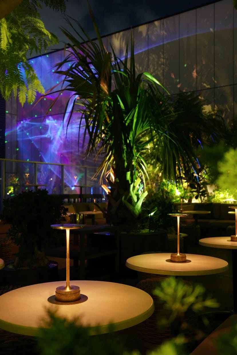 Aoyama Grand Hotel rooftop lounge with accent lighting for premium networking events.