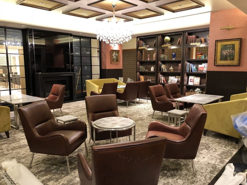 Private room at City Club of Tokyo with velvet seating for VIP networking and event consultations.