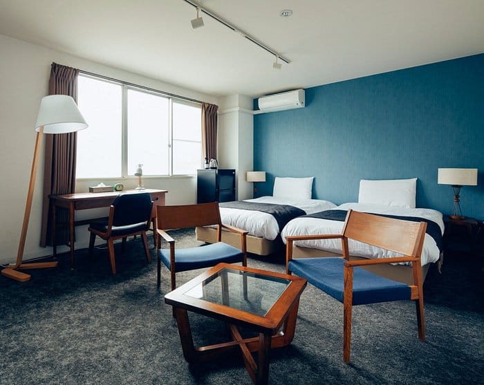 Hotel Graphy Nezu twin room with workspace for corporate breakout and business travel.