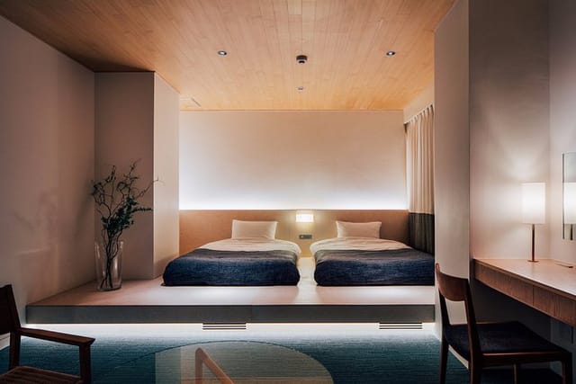 Minimalist twin room at Hotel Graphy Nezu, perfect for executive lodging and incentive travel.