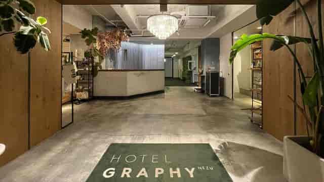 Boutique rooftop lobby at Hotel Graphy Nezu, ideal for networking events and receptions.