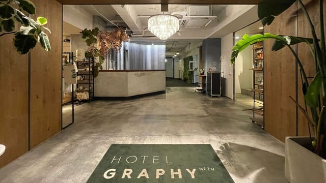 Boutique rooftop lobby at Hotel Graphy Nezu, ideal for networking events and receptions.