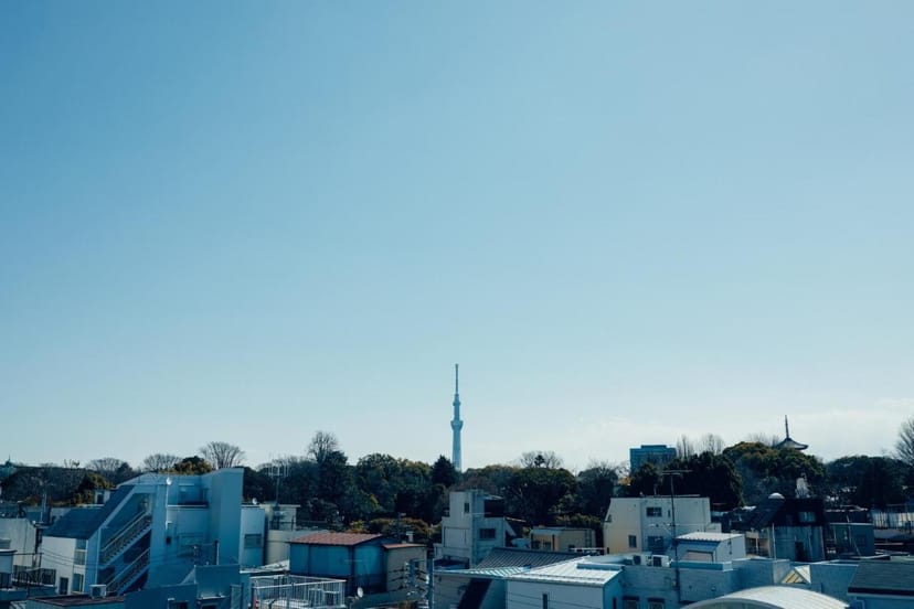 Rooftop venue at HOTEL GRAPHY NEZU with Tokyo Skytree view for networking reception breakout session.