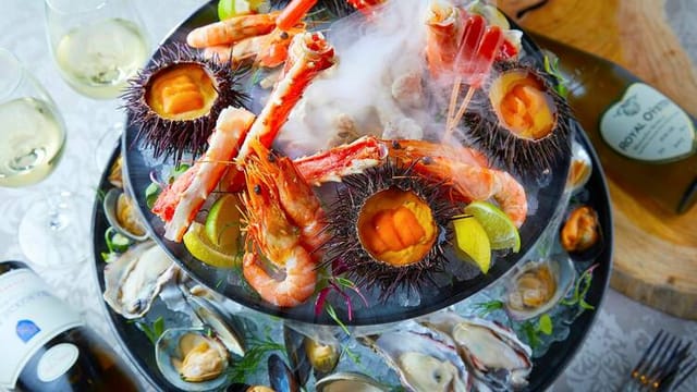 Premium seafood tower at Fish Bank Tokyo gala networking event.