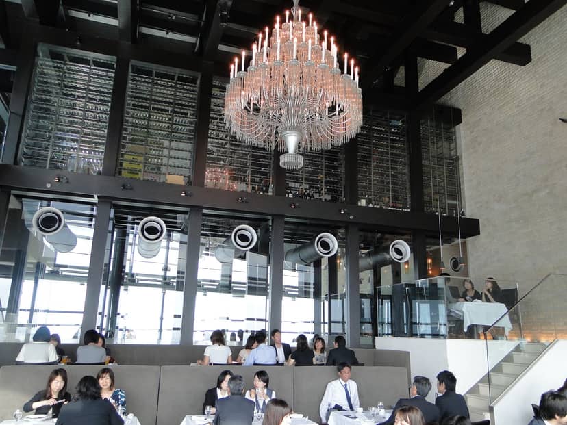 Fish Bank TOKYO dining room with wine display for corporate events and networking receptions.