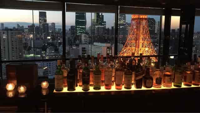 Illuminated back-bar at Sky Lounge Stellar Garden for premium evening receptions and corporate events.